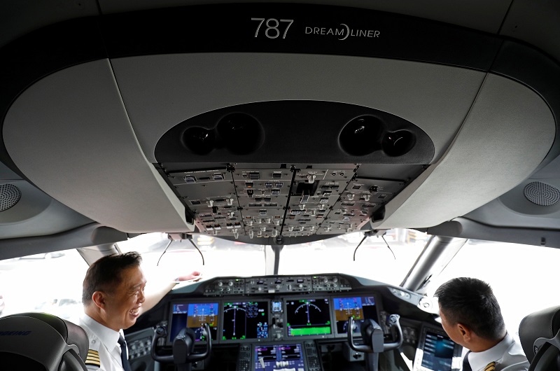 Pilots sit in the cockpit of Singapore Airlines' first Boeing 787-10 Dreamliner at Singapore's Changi Airport March 28, 2018. u00e2u20acu201d Reuters pic  