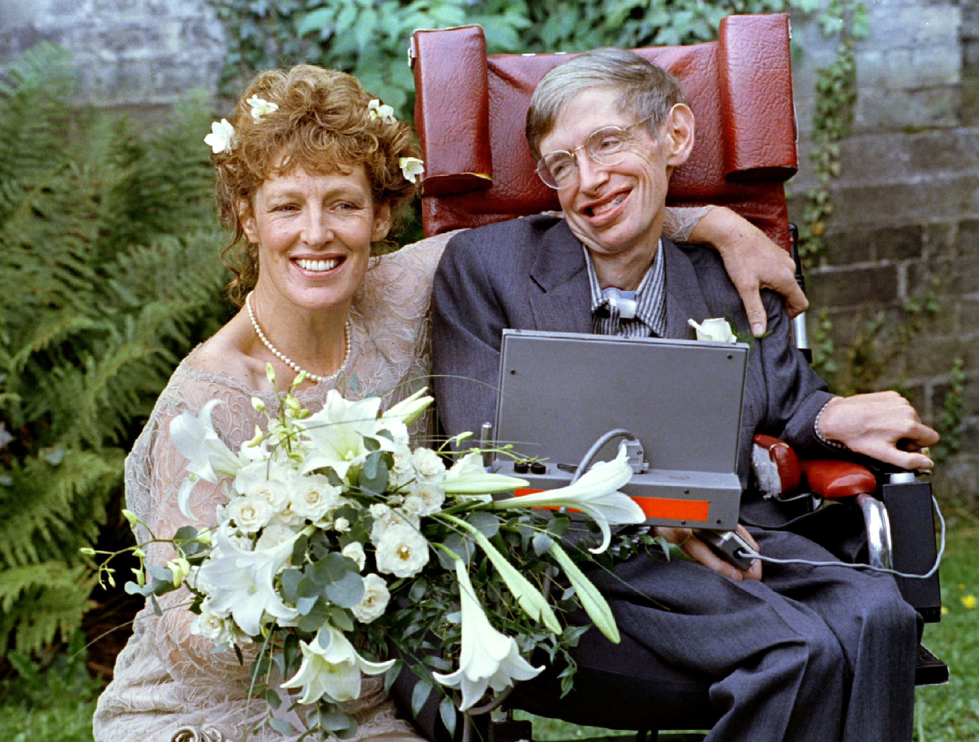 Stephen Hawking and his new bride Elaine Mason pose for pictures after the blessing of their wedding at St. Barnabus Church September 16, 1995. u00e2u20acu201d Reuters pic