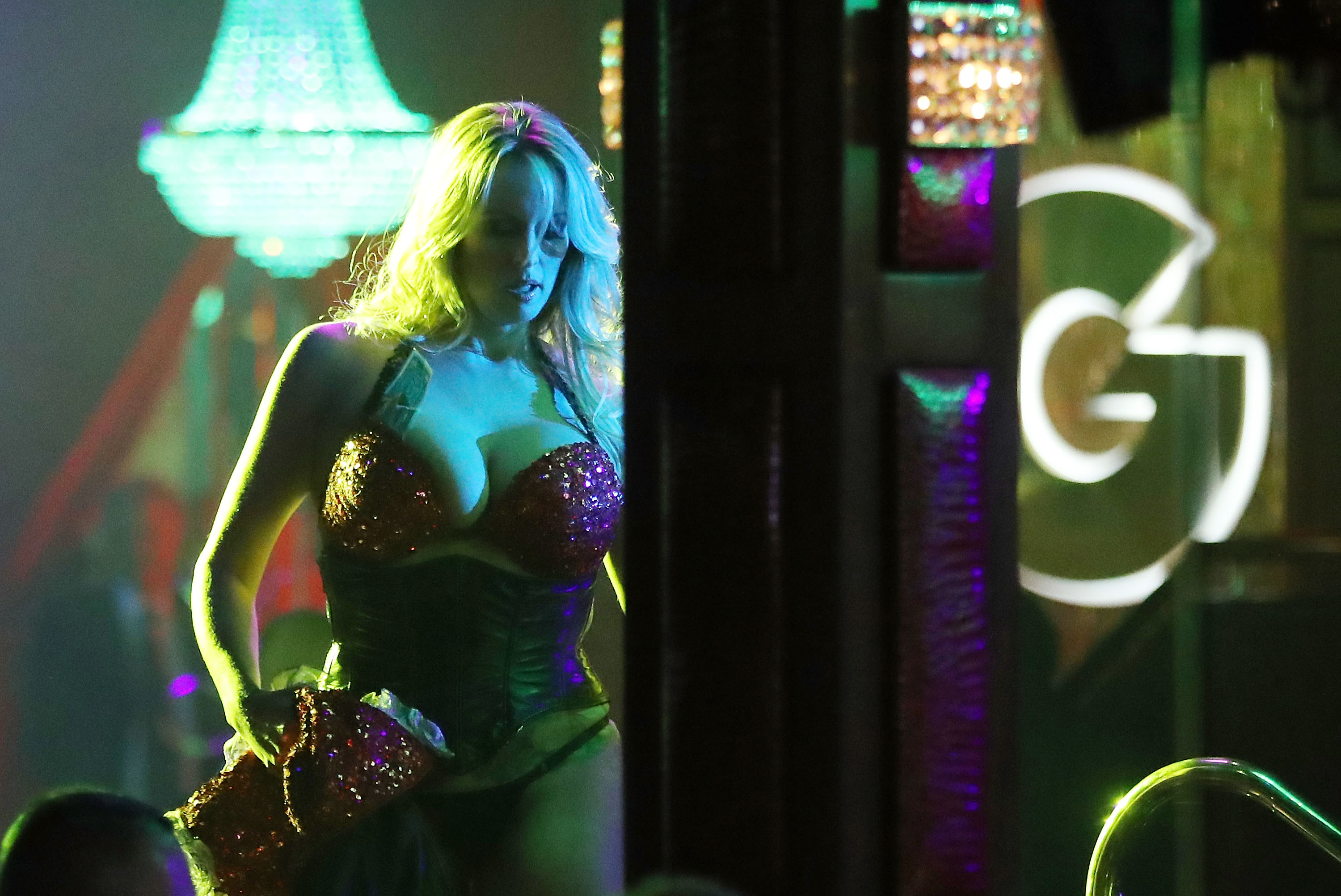 In this file photo taken on March 9, 2018 The actress Stephanie Clifford, who uses the stage name Stormy Daniels, performs at the Solid Gold Fort Lauderdale strip club in Pompano Beach, Florida. u00e2u20acu201d AFP pic