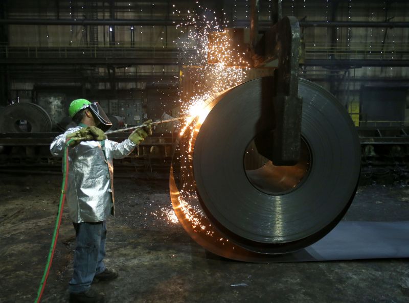 A worker cuts a piece from a steel coil at the Novolipetsk Steel PAO steel mill in Farrell, Pennsylvania March 9, 2018. u00e2u20acu2022 Reuters pic