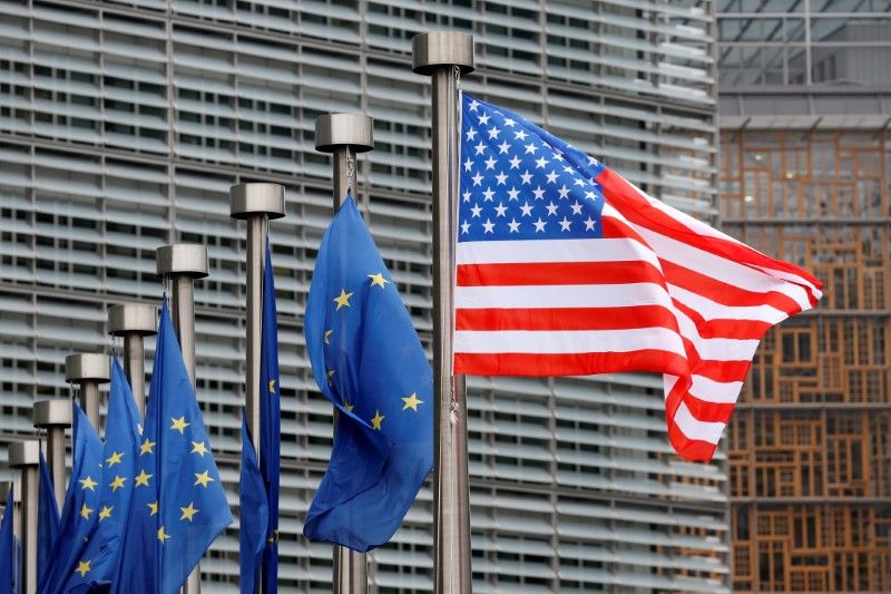 US and European Union flags are pictured at the European Commission headquarters in Brussels. u00e2u20acu2022 Reuters pic
