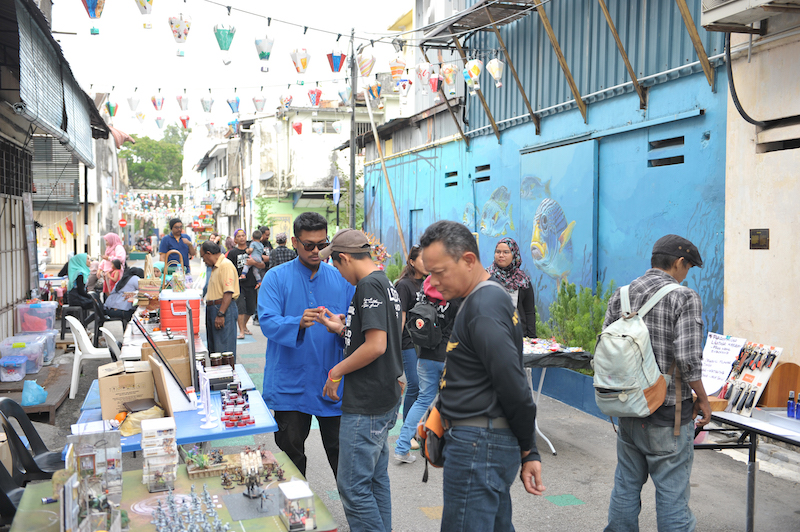 There are about 14 stalls at the weekly Butterworth Art Market. — Picture by KE Ooi