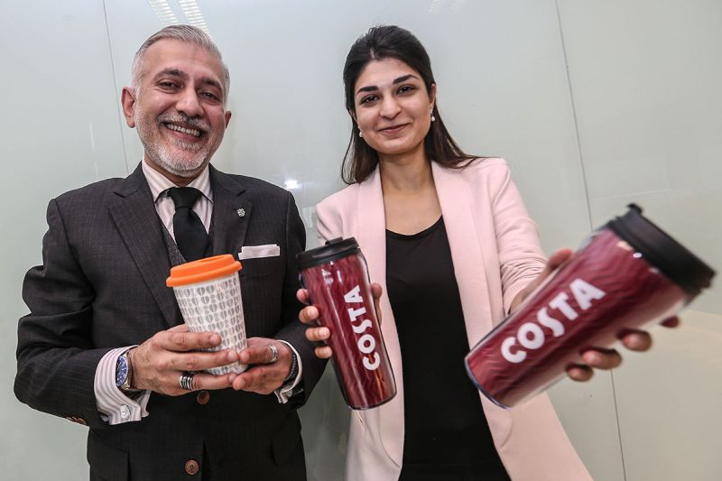 CEO of Costa Coffee Malaysia, Irfan Hamid Abdul Hamid (left) with Gapurna Permai director Nor Izzati Mohamad Salim (right) posing with their products at an interview in Kuala Lumpur March 15, 2018. u00e2u20acu2022 Picture by Hari Anggara