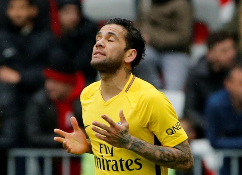 Paris Saint-Germainu00e2u20acu2122s Dani Alves celebrates after scoring the second goal against Nice, March 19, 2018. u00e2u20acu2022 Reuters pic