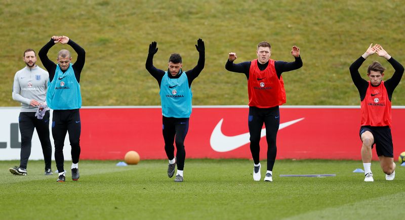 (From left) Englandu00e2u20acu2122s Jack Wilshere, Alex Oxlade-Chamberlain, Alfie Mawson and James Tarkowski during training at St. Georgeu00e2u20acu2122s Park, Burton Upon Trent, Britain, March 22, 2018. u00e2u20acu201d Reuters pic