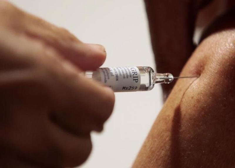 A nurse vaccinates a patient as part of the start of the seasonal influenza vaccination campaign in Nice, southeastern France. u00e2u20acu201d Reuters pic