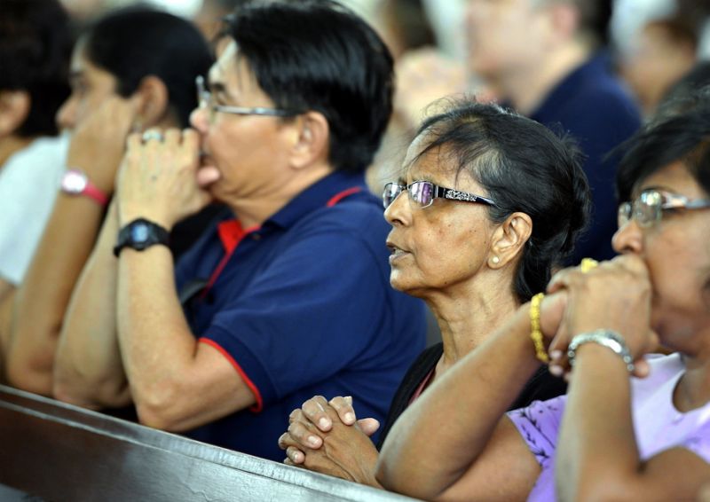 Servers march towards the altar during the Good Friday service at The Cathedral of St John, Kuala Lumpur March 30, 2018. u00e2u20acu2022 Picture by Ham Abu Bakar