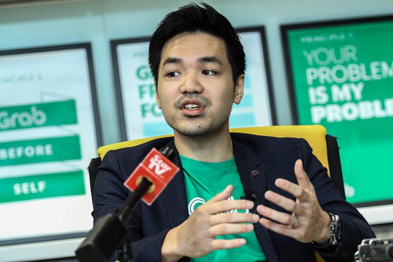 Grab Malaysia Country Head Sean Goh speaks to reporters in Petaling Jaya on March 29, 2018. u00e2u20acu201d Picture by Miera Zulyana