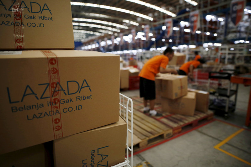 Employees at online retailer Lazada fill orders at the company's warehouse in Jakarta, Indonesia April 15, 2016. u00e2u20acu201d Reuters pic