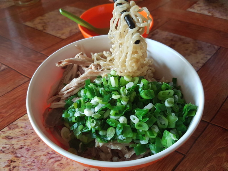 A bowl of noodles with extra chicken costs Rp 40,000 at Bakmi Atjuan. u00e2u20acu201d Jakarta Globe pic