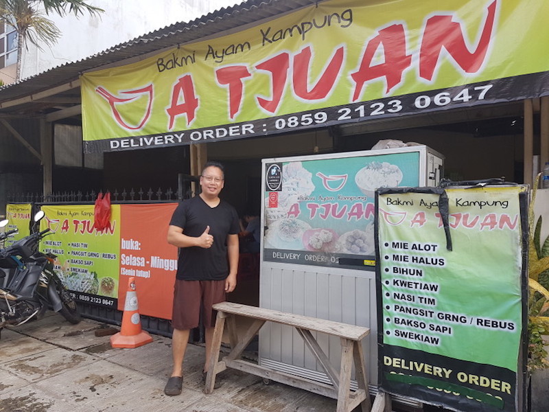 Steve the owner stands at the entrance of his restaurant. — Jakarta Globe pic
