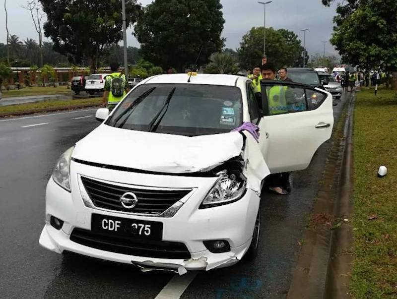 The car said to have been driven by the event volunteer that crashed into four runners on Sunday morning. — Picture courtesy of PDRM