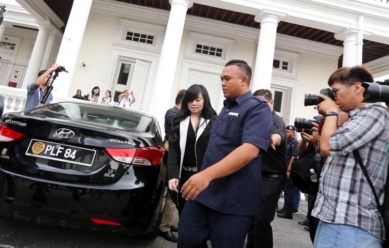 Businesswoman Phang Li Koon (centre) leaves the Penang High Court in George Town March 26, 2018. u00e2u20acu201d Picture by Sayuti Zainudin