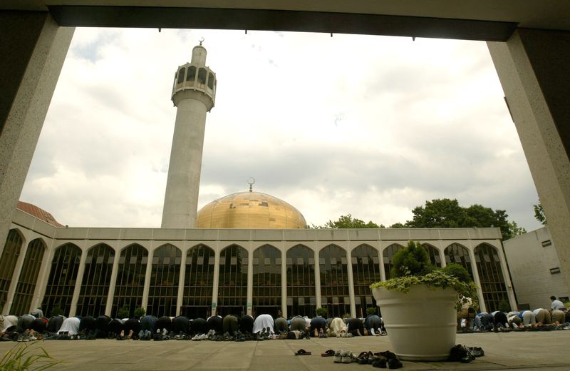 Muslims kneel at Londonu00e2u20acu2122s Central Mosque in Regents Park during Fridayu00e2u20acu2122s prayers on July 15, 2005. Two London mosques were given special listed status in recognition of their architectural and historic importance. u00e2u20acu201d AFP pic