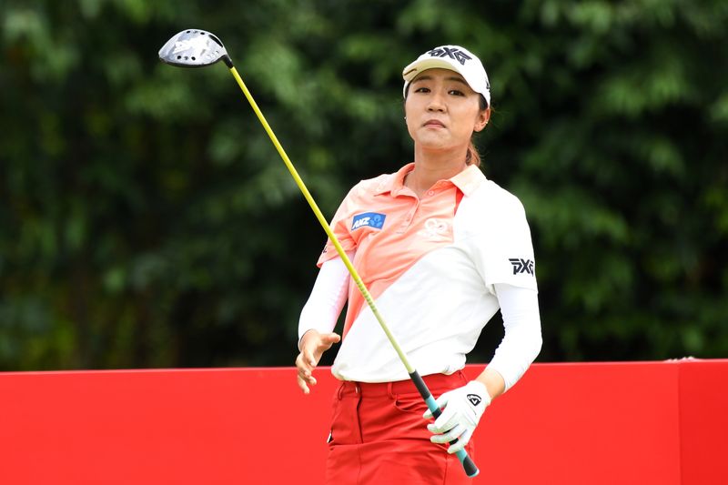 Lydia Ko of New Zealand watches her shot during the round one of the HSBC Womenu00e2u20acu2122s World Championship golf tournament in Singapore on March 1, 2018. u00e2u20acu201d AFP pic
