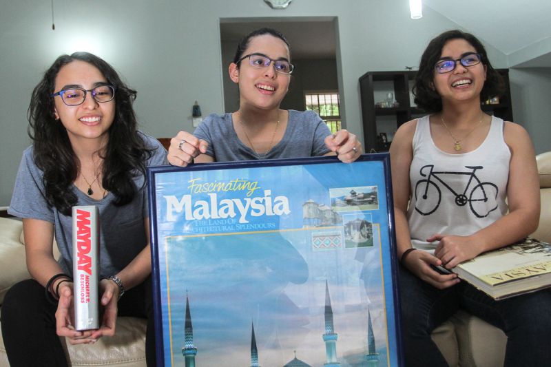 (From left) Tun Mayday, Tun Malaysia and Tun Mardeka share their stories with Malay Mail at their home in Shah Alam. ― Picture by Shafwan Zaidon