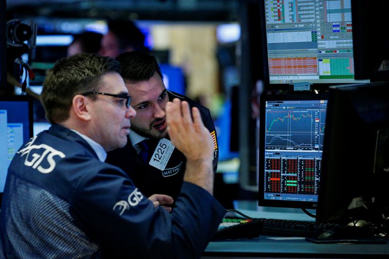 Traders work on the floor of the New York Stock Exchange, (NYSE) in New York, March 7, 2018. u00e2u20acu201d Reuters pic