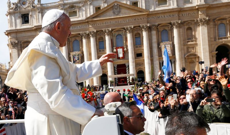 Pope Francis waves from his Papamobile after the Palm Sunday Mass in Saint Peter's Square at the Vatican, March 25, 2018. u00e2u20acu201d Reuters pic