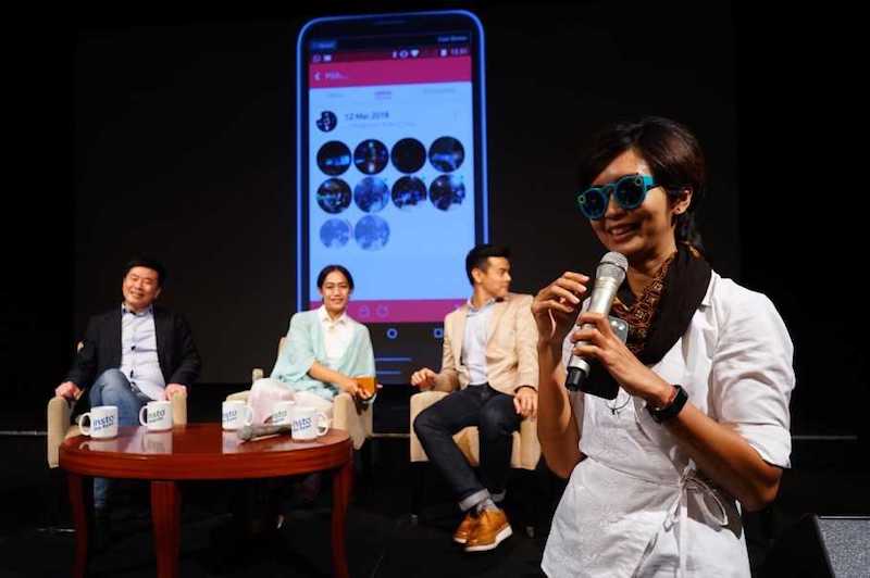 Trying on Snapchat Spectacles to shoot videos during 'Buka Mata, Buka Cerita' press conference in South Jakarta on Monday. u00e2u20acu201d Handout via Jakarta Globe