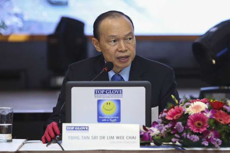 Top Gloves executive chairman Tan Sri Lim Wee Chai speaks during the US$310 million credit facilities signing ceremony at Top Glove Tower in Shah Alam March 16, 2018. u00e2u20acu2022 Picture by Yusof Mat Isa