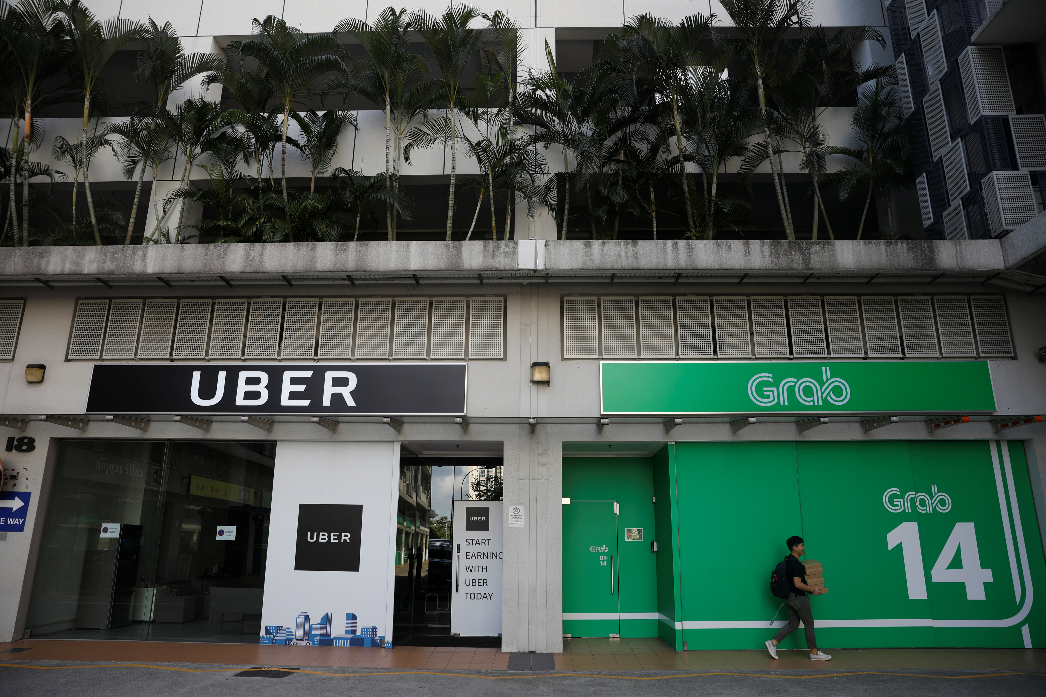 A view of Uber and Grab offices in Singapore March 26, 2018. u00e2u20acu201d Reuters pic