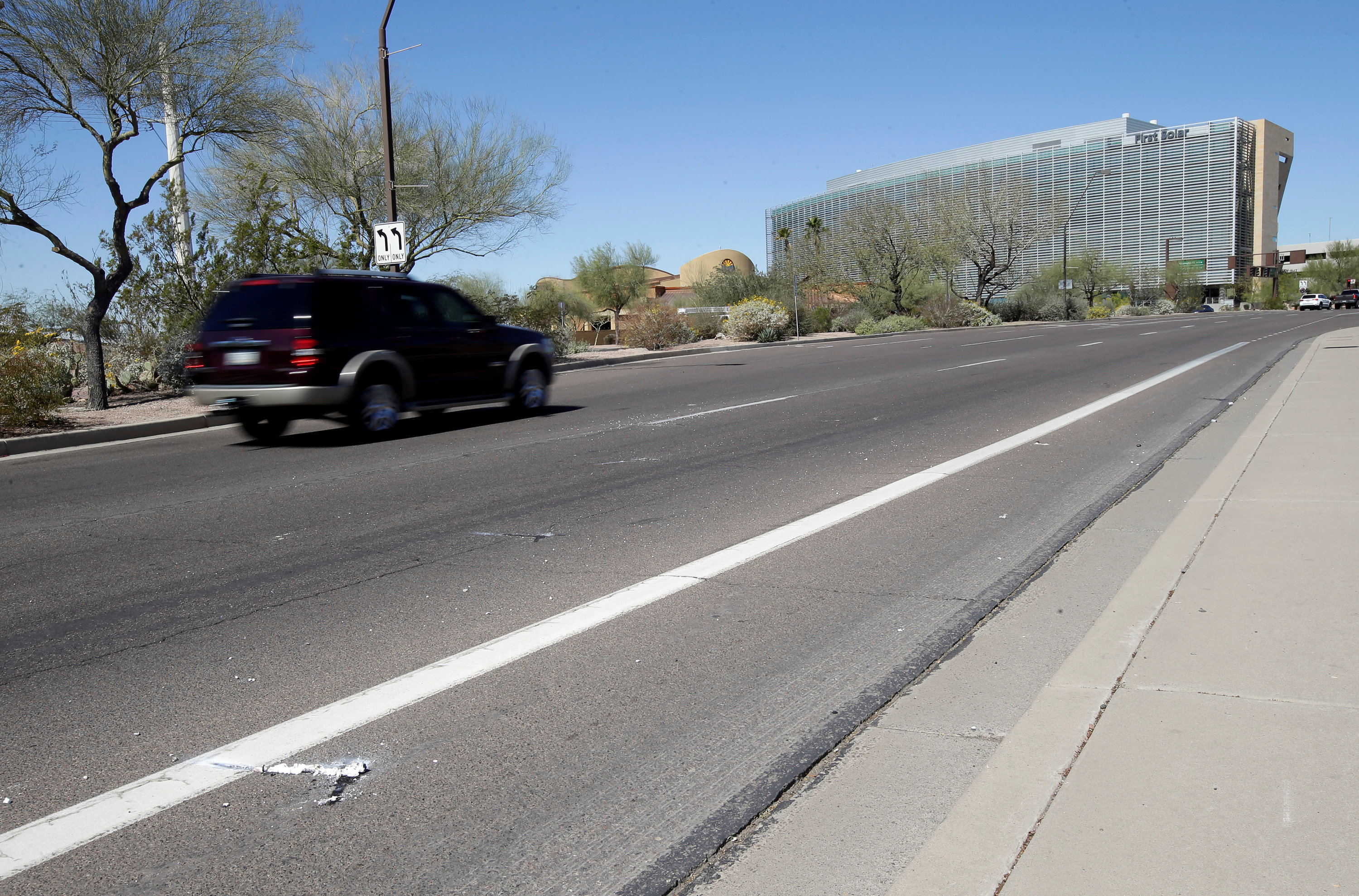 Burned out flares lie at the location where a woman pedestrian was struck and killed by an Uber self-driving sport utility vehicle in Tempe, Arizona, March 19, 2018. u00e2u20acu201d Reuters pic