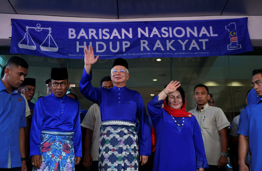 Datuk Seri Najib Razak arrives to submit his nomination papers with his wife Datin Seri Rosmah Mansor in Pekan, Pahang April 28, 2018. u00e2u20acu201d Reuters pic