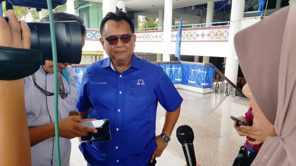 State Barisan Nasional secretary general Datuk Alexander Nanta Linggie appeals to Datuk Joseph Entulu Belaun to help the BN candidate in Selangau in the campain in the general election, April 26, 2018. u00e2u20acu201d Picture by Sulok Tawie