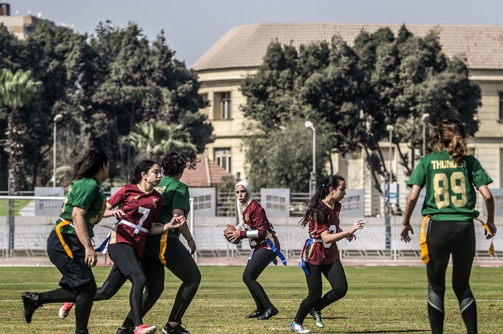 Egyptian female American football players from the AUC Titans (red) play against Gezira Thunder (green) during their match at the Maadi Olympic Centre in the southern Cairo suburb of Maadi on March 10, 2018. u00e2u20acu201d AFP pic