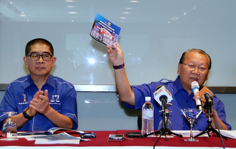 PBS president Tan Sri Joseph Pairin Kitingan (right) said the additional manifesto touched on issues close to the people in Sabah and the PBS struggle. u00e2u20acu2022 Bernama pic