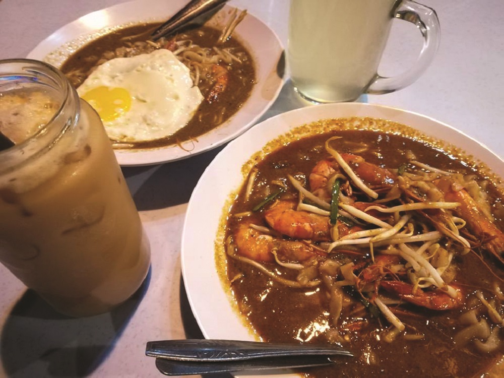 Sister’s Place’s seafood-laden ‘char kuey teow‘ is worth the price you pay for it.