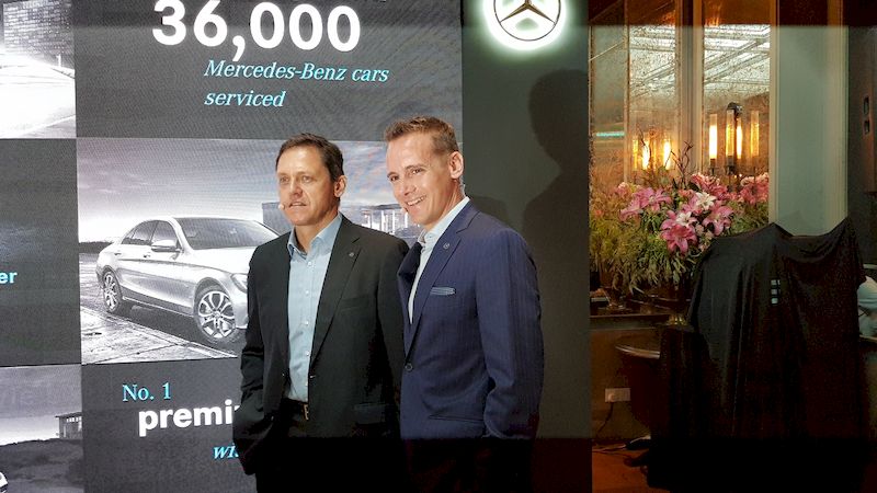 Picture shows Dr Claus Weidner, Mercedes-Benz Malaysia President and CEO with Mark Raine.