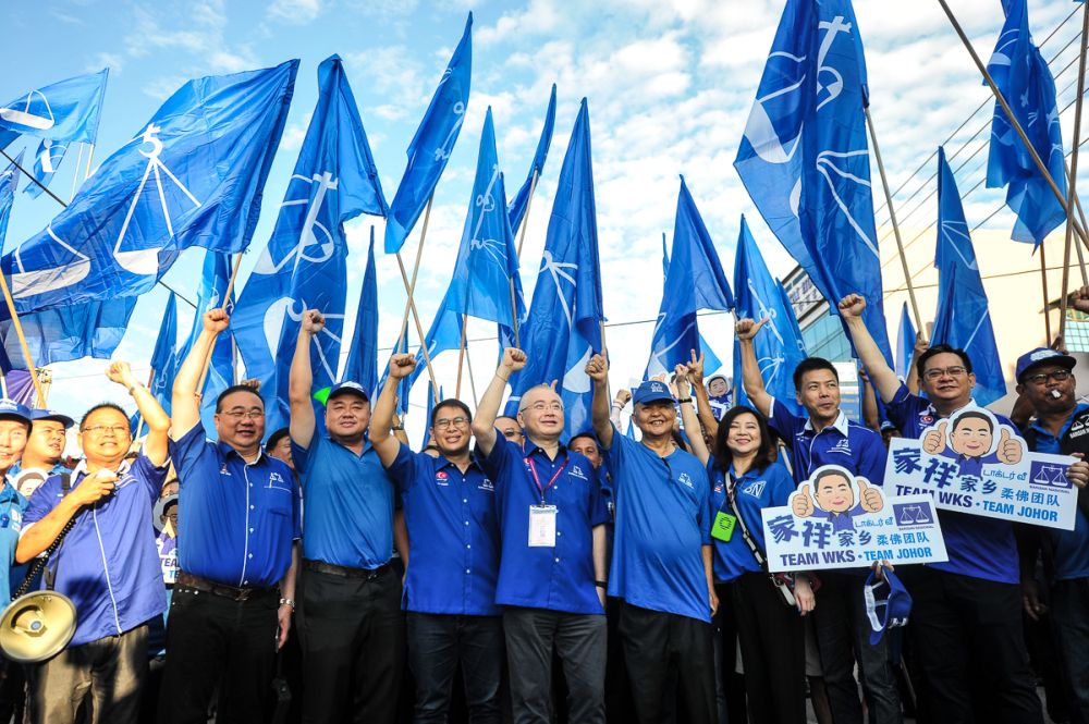 Barisan Nasionalu00e2u20acu2122s Ayer Hitam candidate Datuk Seri Wee Ka Siong (fourth left) arrives at the nomination centre in Yong Peng in Johor Baru April 28, 2018. u00e2u20acu2022 Picture by Shafwan Zaidon