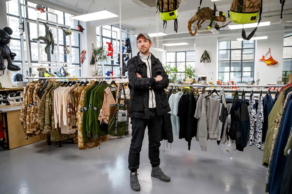 British fashion designer Christopher Raeburn poses for a photograph at his studio in Hackney, east London March 16, 2018. u00e2u20acu201d AFP pic