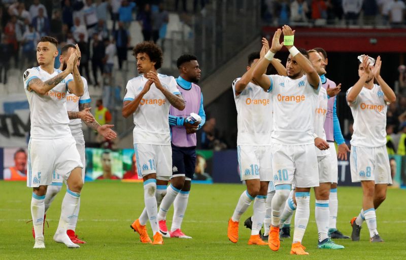Marseille's Dimitri Payet and team mates applaud fans after the match against RB Salzburg, April 26, 2018. u00e2u20acu2022 Reuters pic