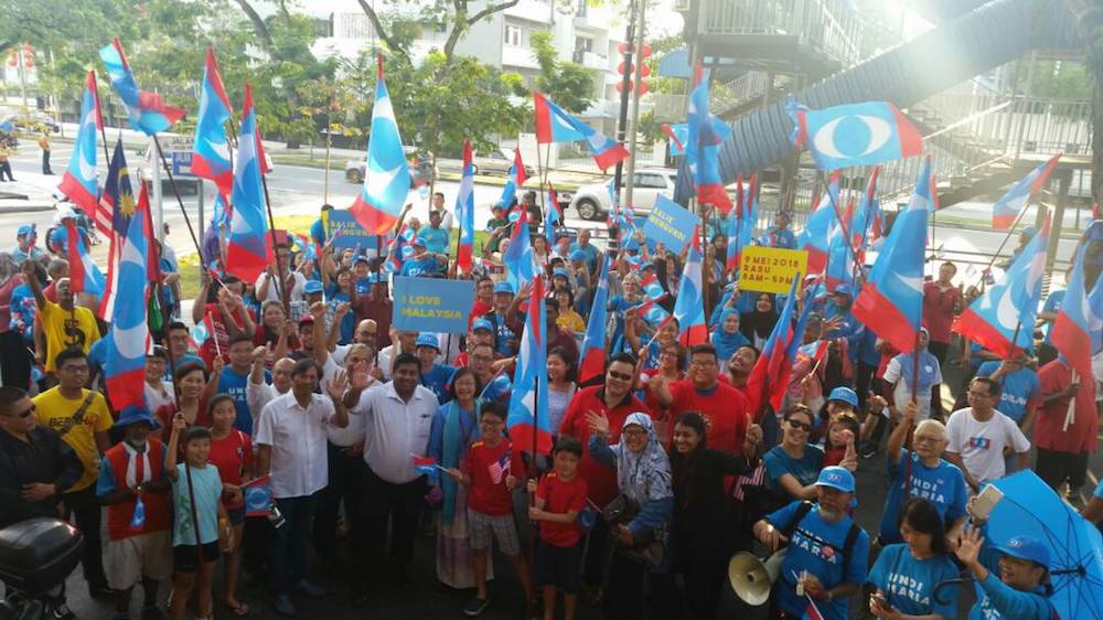 Candidates for Pakatan Harapan for the Petaling Jaya and Bukit Gasing seats, Maria Chin Abdullah and Rajiv Rishyakaran, gather with supporters ahead of nominations. u00e2u20acu201d Picture by Ida Lim