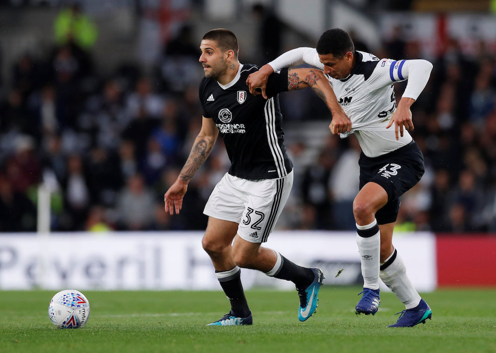 Fulhamu00e2u20acu2122s Aleksandar Mitrovic in action with Derby Countyu00e2u20acu2122s Curtis Davies during their Championship Play-off Semi-Final First Leg match in Derby May 11, 2018. u00e2u20acu201d Action Images pic via Reuters