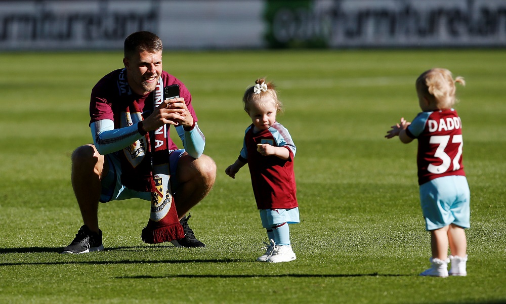Burnley's Johann Berg Gudmundsson celebrates with his children during a lap of honour after the match against Bournemouth  in Burnley May 13, 2018. u00e2u20acu201d Picture by Action Images via Reuters