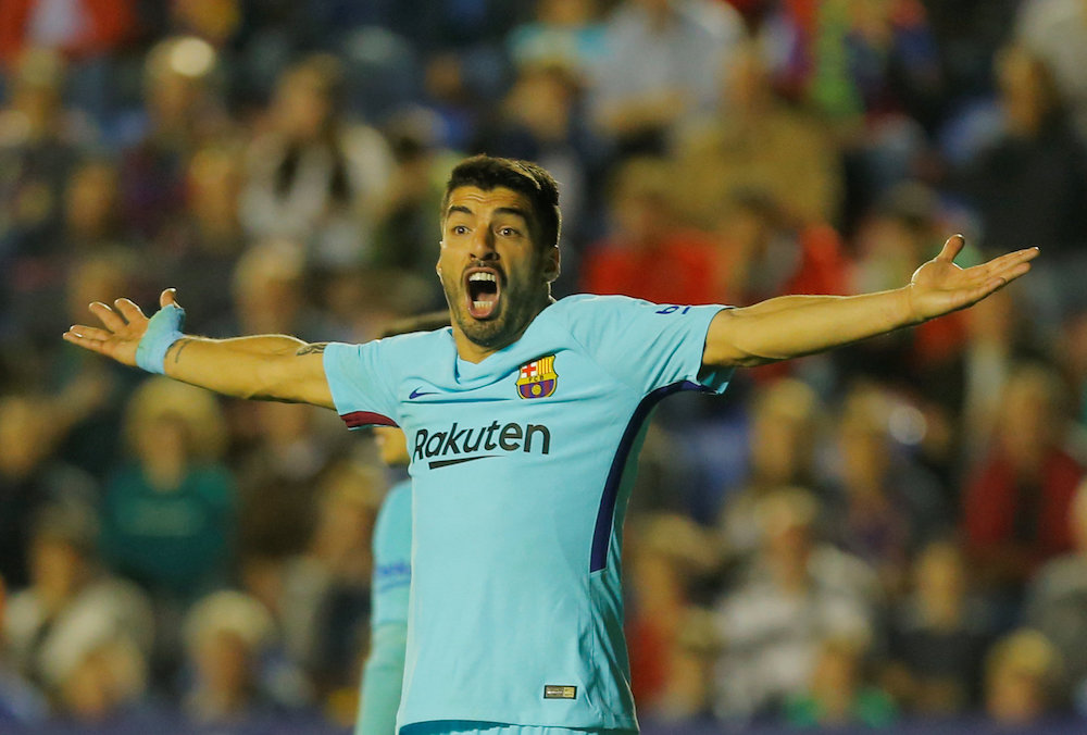 Barcelonau00e2u20acu2122s Luis Suarez reacts during their match against Levante in Valencia May 13, 2018. u00e2u20acu201d Reuters pic
