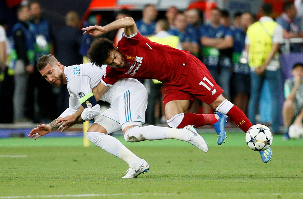 Liverpoolu00e2u20acu2122s Mohamed Salah injures his shoulder in a challenge with Real Madridu00e2u20acu2122s Sergio Ramos during the 2018 Champions League Final in Kiev May 26, 2018. u00e2u20acu201d Reuters pic