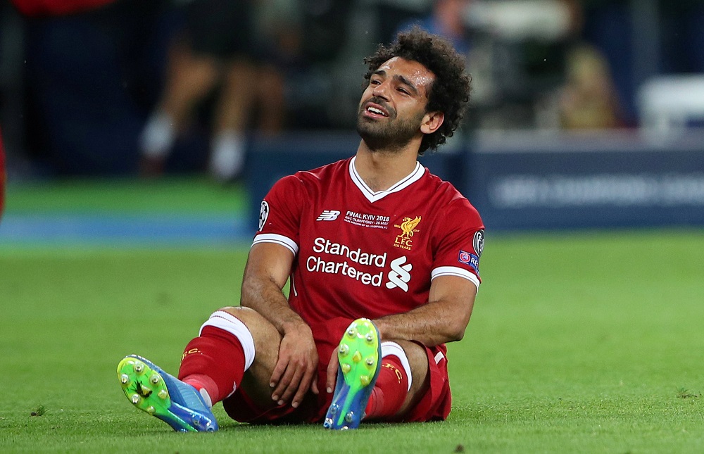 Liverpool's Mohamed Salah looks dejected after sustaining an injury during the Champions League Final in Kiev May 26, 2018. u00e2u20acu201d Reuters pic