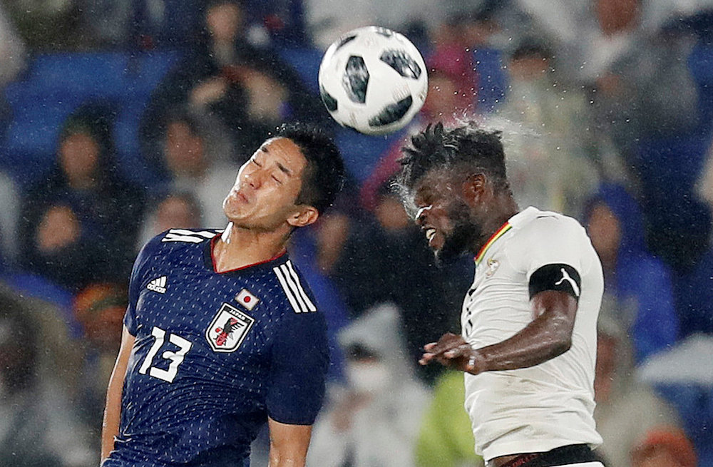 Japanu00e2u20acu2122s Yoshinori Muto in action with Ghanau00e2u20acu2122s Thomas Partey during an international friendly in Yokohama May 30, 2018. u00e2u20acu201d Reuters pic