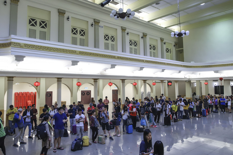 People line up at the KL and Selangor Chinese Assembly Hall to head back to their hometowns to vote in GE14, via the Undi Rabu initiative May 8, 2018. u00e2u20acu201d Picture by Azneal Ishak. 