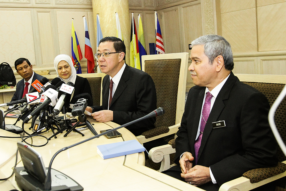 Minister of Finance Lim Guan Eng (second right) speaks during a press conference in Putrajaya May 22, 2018. u00e2u20acu201d Picture by Miera Zulyana