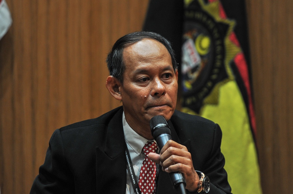 Malaysian Anti-Corruption Commission (MACC) chief commissioner Datuk Sri Mohd Shukri Abdull reacts during a press conference at the MACC headquarters in Putrajaya May 22, 2018. u00e2u20acu201d Picture by Shafwan Zaidon