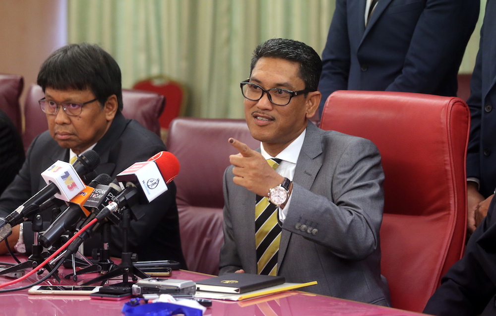 Mentri Besar Ahmad Faizal Azumu and state officials speak to the press after attending their first exco meeting at the State Secretariat Building in Ipoh May 23, 2018. u00e2u20acu201d Picture by Farhan Najib