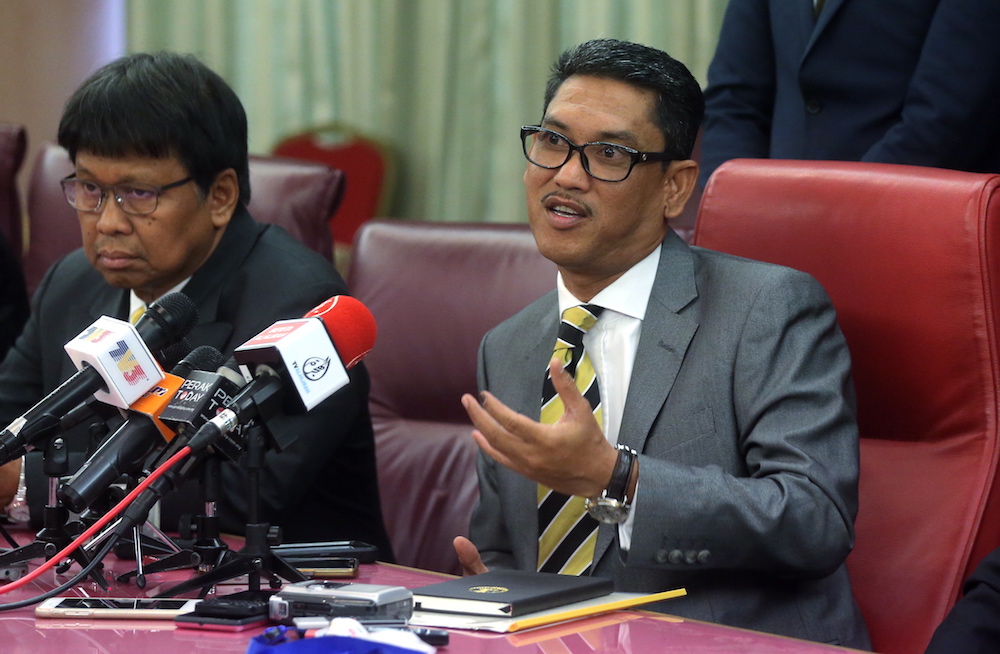 Mentri Besar Ahmad Faizal Azumu and state officials speak to the press after attending their first exco meeting at the State Secretariat Building in Ipoh May 23, 2018. u00e2u20acu201d Picture by Farhan Najib