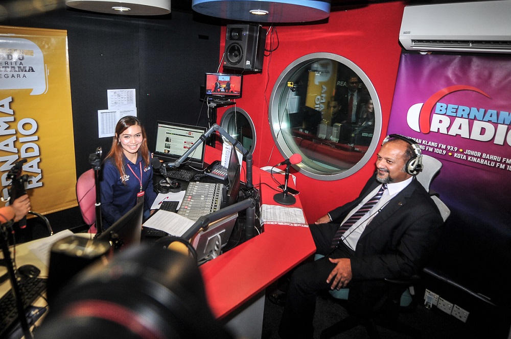 Communications and Multimedia Minister Gobind Singh Deo (right) speaks during an interview with Bernama  Radio at Wisma Bernama in Kuala Lumpur May 28, 2018. u00e2u20acu201d Picture by Shafwan Zaidon