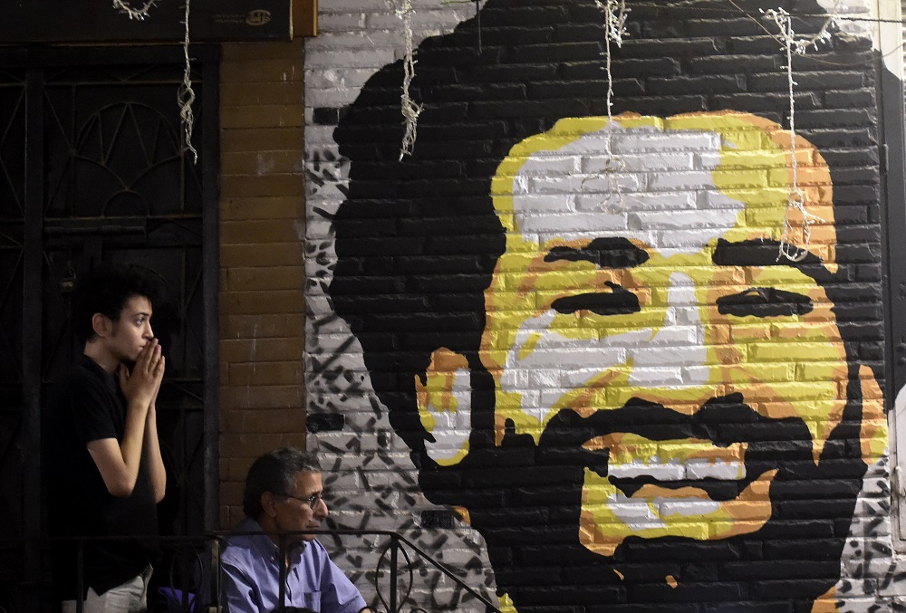 A man reacts as he watches the the Uefa Champions League final football match, between Real Madrid and Liverpool, at a coffee shop in the Egyptian capital Cairo May 26, 2018. u00e2u20acu201d AFP pic