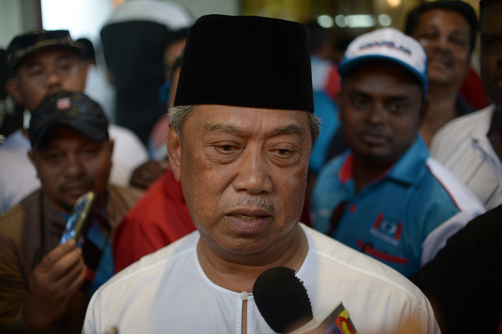Parti Pribumi Bersatu Malaysia (PPBM) president Tan Sri Muhyiddin Yassin is seen outside Datuk Seri Anwar Ibrahimu00e2u20acu2122s house in Bukit Segambut May 16, 2018. u00e2u20acu201d Picture by Mukhriz Hazim